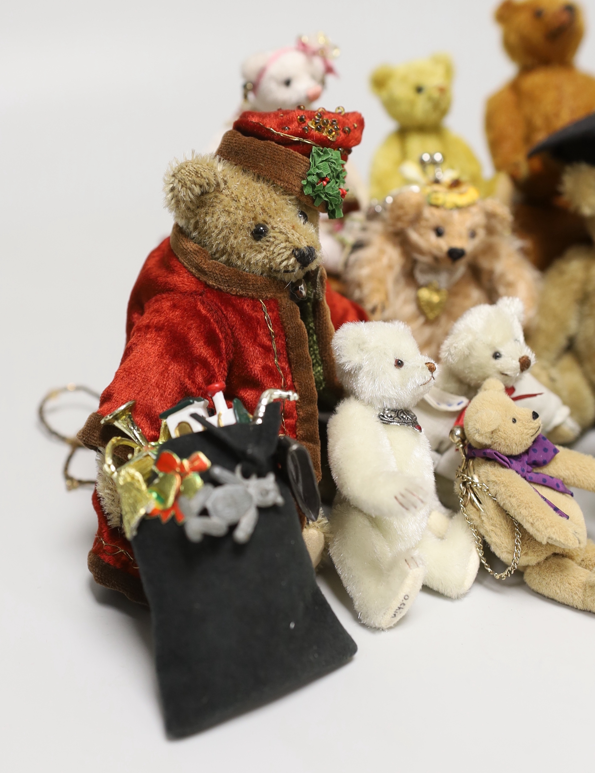 Twelve miniature American artist's bears and one rabbit